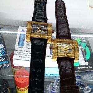 Gold Rectangular Watches with Black and Brown Straps